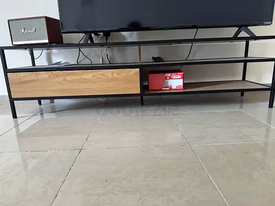 Brown and black TV Stand