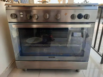 Five burner gas cooking range.