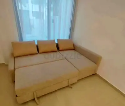IKEA L Shape Sofa cum bed with big storage and you can fix the storage