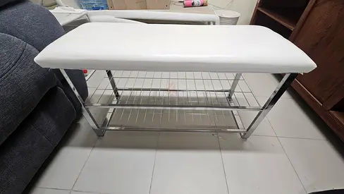 White Padded Shoe Bench with Chrome Frame and Storage Shelves