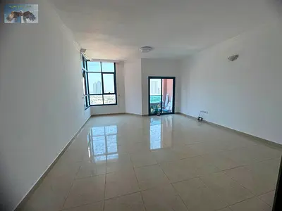 For annual rent in Ajman, a large two-bedroom apartment with a living room and a spacious master storage room is available in Al Nuaimiya Towers, next