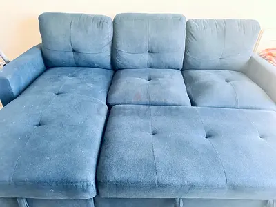 Blue fabric 3-seater sofa bed / lounge in good condition