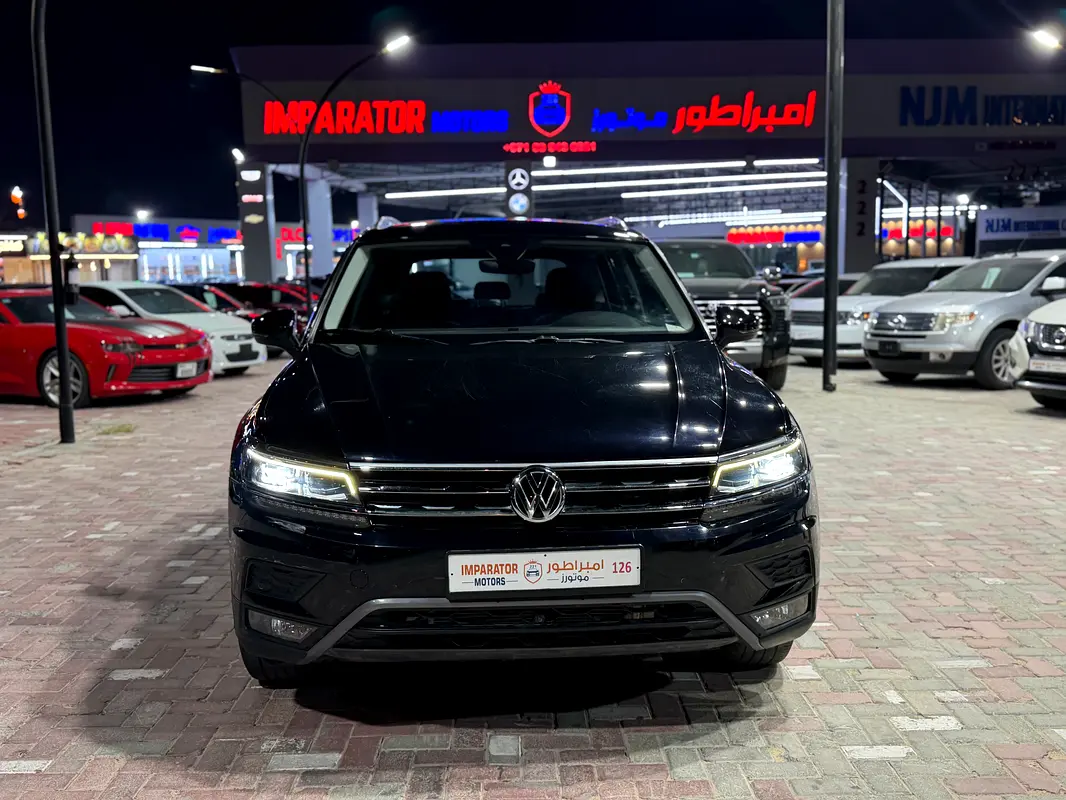 Volkswagen Tiguan 2019 — photo 1 of 15