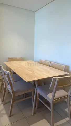 Light Wood 6-Seater Dining Table with Cushioned Chairs