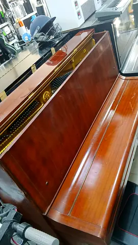 Yamaha U2 Upright acoustic piano in wooden finish - good working condition