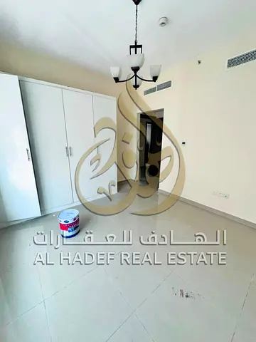 2BR Apartment • Al Majaz 2 • Master Bedroom & Wardrobes