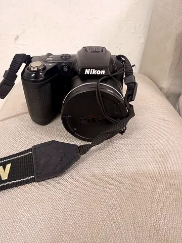 Nikon coolpix L310 Bridge compact digital camera with strap - good condition