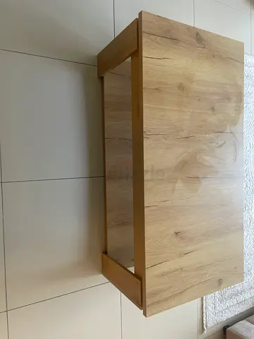 Simple light-wood coffee table with lower shelf - good condition