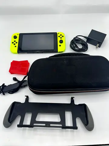 Nintendo Switch (Neon Yellow Joy‑Cons) with Case, Charger and Grip