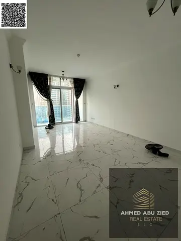Spacious 2 Bedroom Apartment for Annual Rent in Oasis Towers Al Rashidiya 1 with Pool, Gym, Private Parking and Prime Location