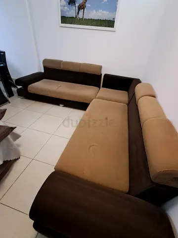 L-shaped brown and beige fabric sofa, good used condition