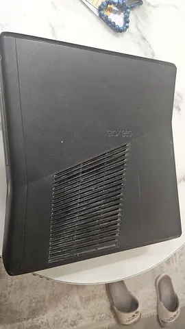 Xbox 360 Slim Console - Used, Working No controllers or power supply fully working has 35 games and