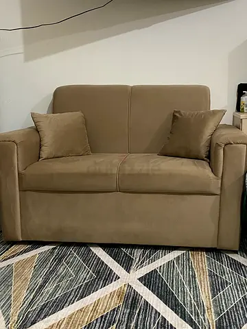 2-seater beige suede sofa in good condition used for 2 months