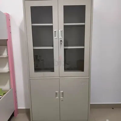 Metal storage cabinet with glass upper doors and lock - used