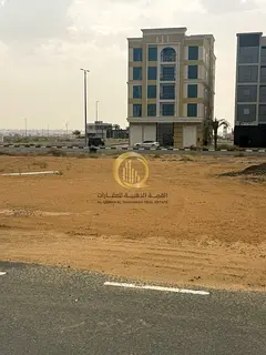 For sale: residential and commercial land in the Tilal area.