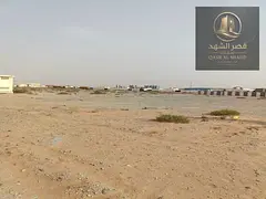 Industrial land for sale in Al Qasimia, with an area of 19,370 square feet.