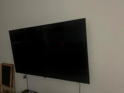 Philips 55 Smart LED TV mounted on wall - good working condition