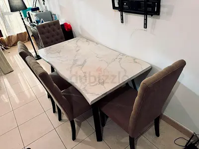 Marble-top dining table with 4 upholstered chairs - good condition