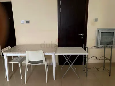A set of tables and water rack