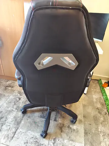 Used black ergonomic gaming/office chair with wheels