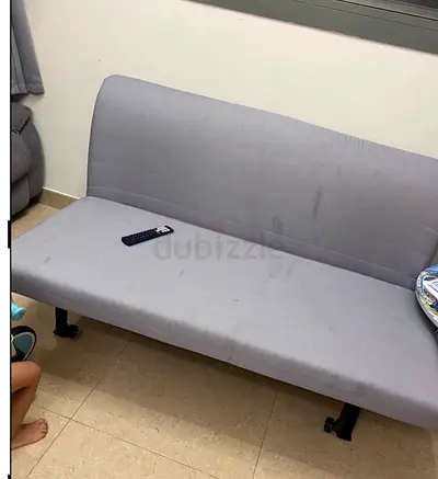 Used light grey 2-seater sofa / futon - compact