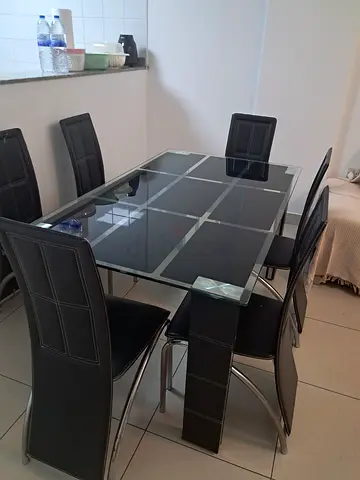 Glass Top Dining Table with 6 Black Chairs