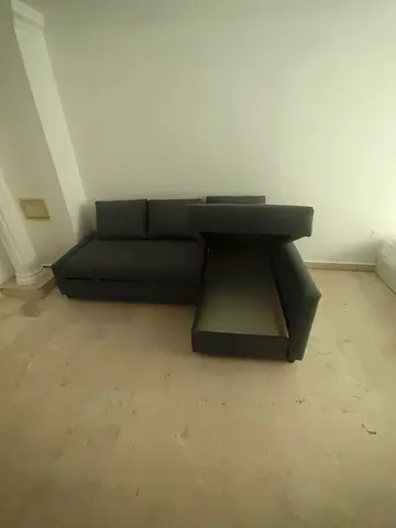 IKEA L Shape Sofa cum bed with big storage and you can fix the storage