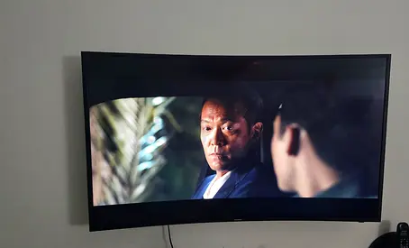Samsung 49-inch Curved 4K Smart TV (Model: UA49KU7350KXZN) in excellent condition.