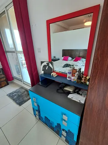 Blue chest of drawers with mirror - good condition