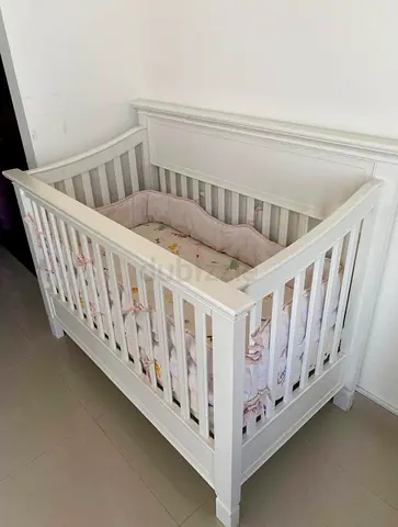 Pottery Barn baby crib with a mattress