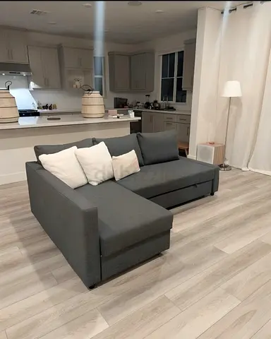 Ikea gray Friheten L-shaped sofa combed