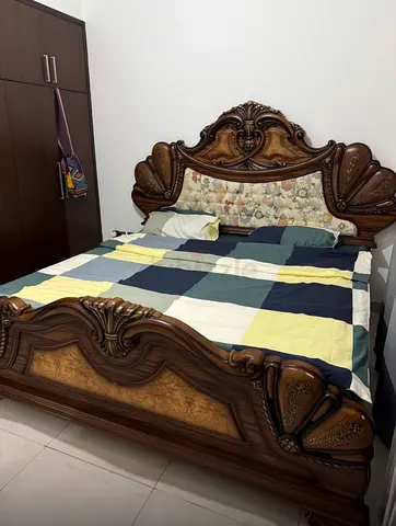 King size bed with mattresses and cover