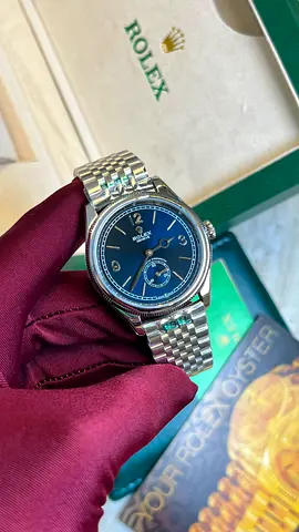 Rolex Oyster Perpetual wristwatch with blue dial, stainless steel Jubilee bracelet