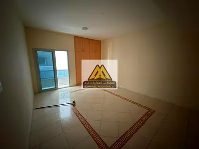 Prime Luxury Location on Sheikh Khalifa Street | Closed Kitchen | 2 Balconies | Built-in Wardrobes | Central AC | Large Parking Area in Front of Build