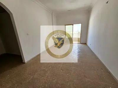 Master bedroom with balcony and spacious sandy parking. Prime, lively location close to all services and near Dubai exit.