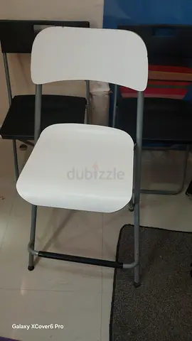 simple white folding chairs - good condition. High chair