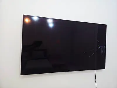 60 inch LED TV with cracked screen - needs repair