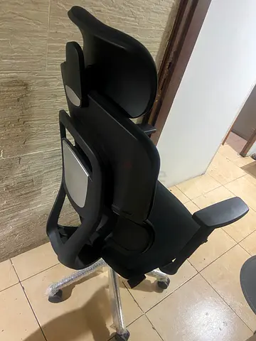 Black Ergonomic Office Chair with Adjustable Headrest