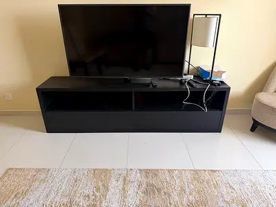 TV unit available for sale. 200x45x55 LxWxH. Average condition. Message if you want TV as well