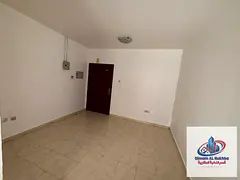 Huge studio, Al Butina Sharjah. Separate kitchen, central AC/gas, luxury finishes. Quiet family bldg