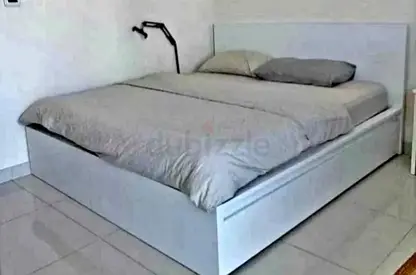 ikea malm king bed with ikea firm mattress   having 2 storage units under the bed