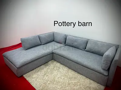 As perfect condition pottery barn grey sofa