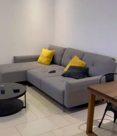 Light grey L-shaped fabric sofa with chaise - great condition