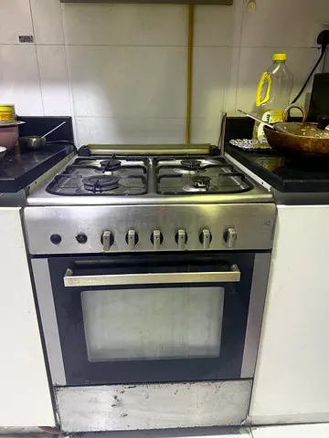 Used stainless steel freestanding gas cooker with oven - good working condition