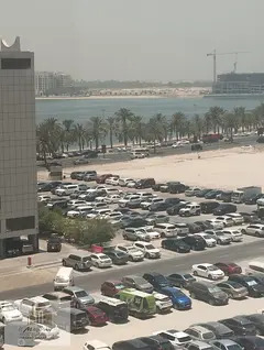For rent: a two-bedroom apartment with a living room in the Emirate of Sharjah, Al Khan area