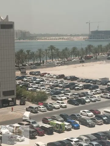 For rent: a two-bedroom apartment with a living room in the Emirate of Sharjah, Al Khan area