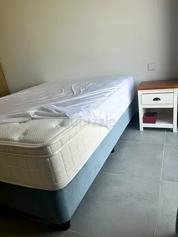 TMS custom bed with top soft mattress