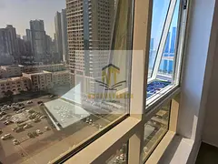 Apartment for sale in Al Khan, Sharjah. Two bedrooms and a living room with private parking. Located