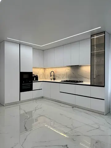 Minimal Modern L-shaped White Kitchen Cabinets with Integrated Appliances