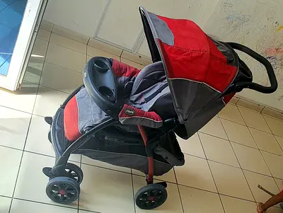 Chicco red stroller with infant car seat and base — used, good condition